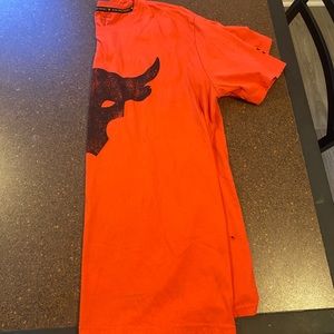 Orange  under armor shirt
